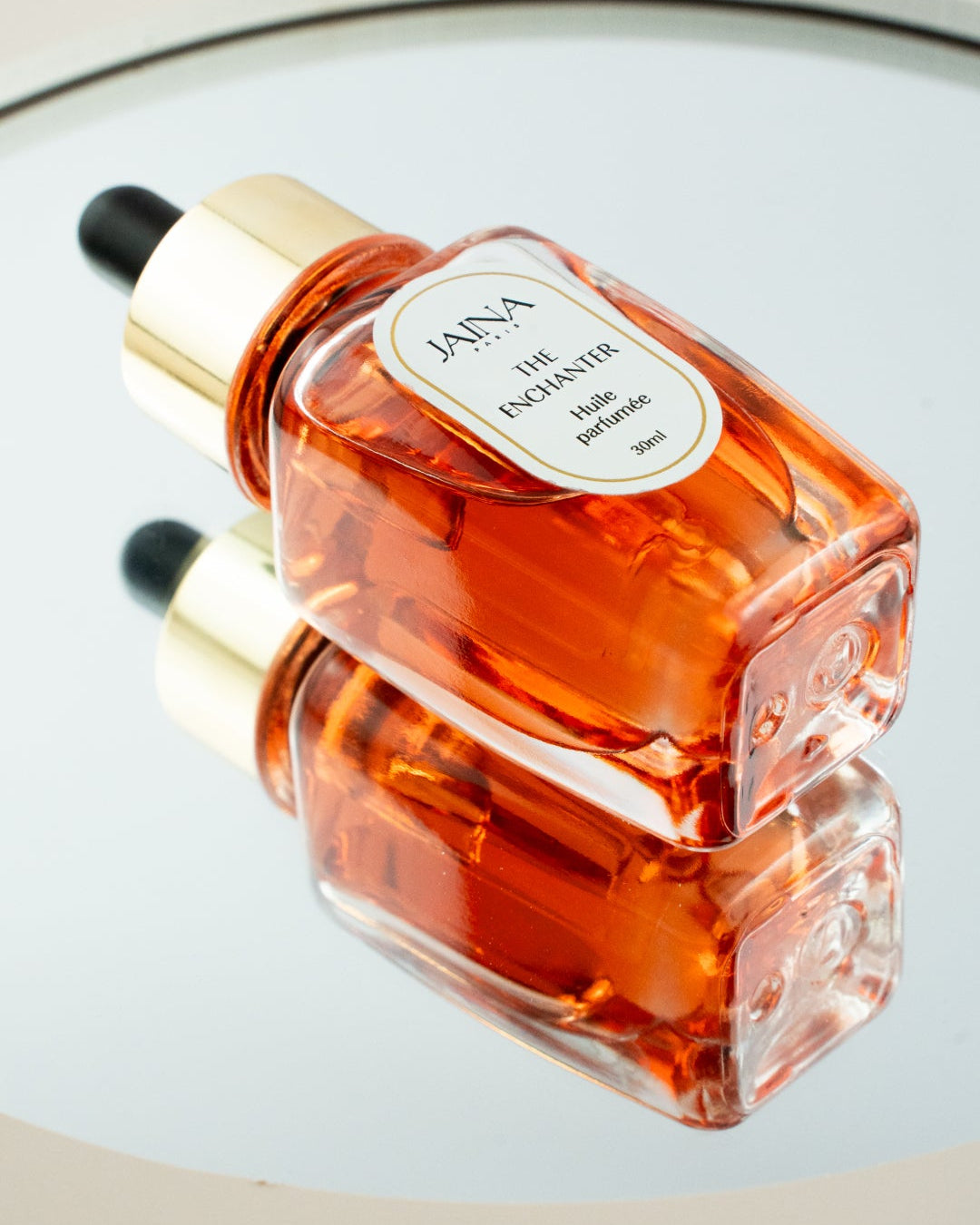 Ritual perfume natural Jaina Paris in glass bottle perfumed rose piri-piri tobacco